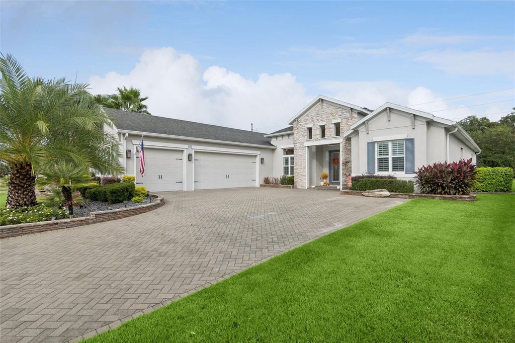 Photo of 8400 Bridgeport Bay Circle, Mount Dora, FL 32757 (MLS # O6447691)