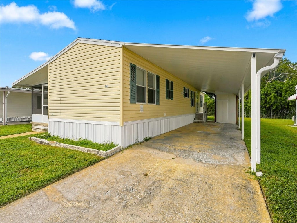 Photo of 3141 Birkdale Drive, Holiday, FL 34690 (MLS # W7890163)