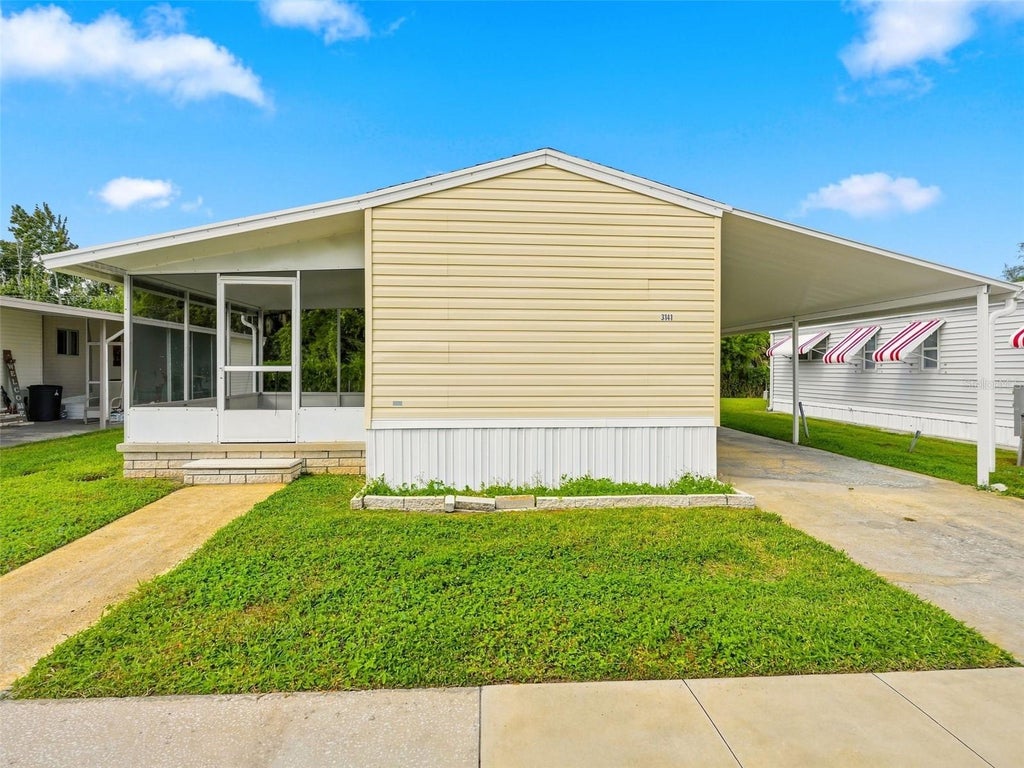 Photo of 3141 Birkdale Drive, Holiday, FL 34690 (MLS # W7890163)