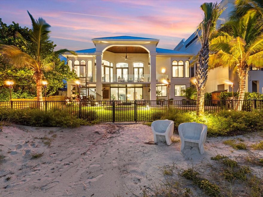 EXCEPTIONAL BEACHFRONT LIVING | 60 FEET OF DIRECT GULF FRONTAGE | EXTENSIVELY RENOVATED

Welcome to your private slice of paradise on Clearwater Beach — a move-in ready, fully renovated 5-bedroom, 5-bathroom coastal retreat offering breathtaking views, unforgettable sunsets, and the kind of beachfront lifestyle that brings families together for generations.

From morning walks along the sand to holiday dinners with your feet in the surf, this home offers more than luxury — it’s a destination for connection. With 60 feet of direct Gulf frontage and expansive views from both levels, you’ll enjoy unobstructed vistas of the water from nearly every room.

Inside, the open-concept layout is ideal for gathering — featuring a designer kitchen with marble countertops, high-end appliances, and a spacious dining and living area anchored by a dramatic water vapor fireplace. With 10+ TVs, a billiards room, and a dedicated office, every space has been curated for both comfort and entertainment.

Whether it’s morning walks along the shoreline, sun-soaked afternoons by the pool, or evenings spent exploring Clearwater’s vibrant dining scene, this home offers the full Florida lifestyle — relaxed, refined, and made for memories.

Step outside to your private backyard oasis — complete with a heated spool (spa/pool combo), built-in fire pit, lush tropical landscaping, and elegant gas lantern lighting. Whether you’re sipping cocktails at sunset, toasting marshmallows under the stars, or watching your kids play in the sand just beyond your gate, this home is made for making memories.

Additional highlights include:
 • 2-story floor plan with Gulf views from both levels
 • 10+ TVs included 
 • Spool with hot tub & gas heater
 • Fire pit for evening relaxation
 • Deeded boat slip & furnishings negotiable
 • Professionally landscaped grounds with multiple outdoor living spaces

Important Note: This home sustained no interior water damage from recent storms.

Beachfront homes of this quality — especially those turnkey, tastefully renovated, and designed for multigenerational living — are rarely available in Clearwater Beach. Schedule your private showing today and envision the holidays, sunsets, and lasting memories that await.