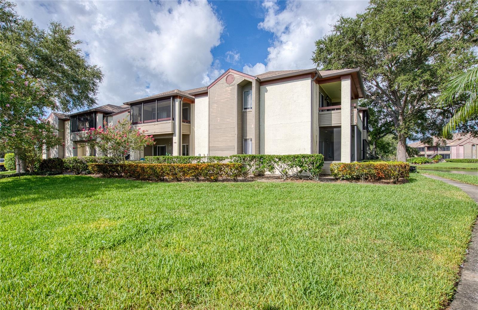 Welcome Home to this charming, FULLY FURNISHED ground-floor condo in the gated Itopia community! This 1-bedroom, 1-bathroom unit offers 729 sq. ft. of bright and airy living space, with a welcoming open-concept layout perfect for both relaxation and entertaining. The spacious living area offers tons of natural light and seamlessly flows into the dining and kitchen areas. The open kitchen design allows you plenty of space to prepare meals while having an unobstructed view of the living and dining areas and private front porch. The generously sized bedroom features a large walk-in closet, ensuring ample storage space for all your needs. The unit comes with all the comforts you need, including a full-size washer and dryer, extra storage on the covered porch, and additional storage closets inside. Your private patio is the perfect spot to relax with a cup of coffee or unwind after a long day. This property is perfect for a first-time buyer, a full-time or seasonal resident, or an investor looking for a prime opportunity. With market rents of about $1700+/month, it offers a healthy annual return for savvy investors. The seller is also open to all reasonable fair market offers and would consider seller financing, making this a great chance for you to secure this gem! The community is packed with amenities designed to enhance your lifestyle – two heated swimming pools with hot tubs, a fitness center, tennis and volleyball courts, car wash station, business center and much more. Itopia is a pet-friendly community, complete with a dog park for your furry friends to enjoy along with several serene lakes for the outdoor enthusiasts. With its prime location just minutes from the Howard Frankland (I-275) and Gandy Bridge, commuting to Tampa or downtown St. Pete is a breeze. Plus, you’re close to nearby shops, restaurants, and everything you need for everyday convenience. Perfectly positioned between Tampa and St. Petersburg, Itopia gives you easy access to Tampa International Airport, MacDill Air Force Base, beautiful St. Pete Beach, and the best of Pinellas County’s finest beaches. Whether you're craving the excitement of the city or the peacefulness of coastal life, Itopia offers the perfect balance. Don’t miss out on this opportunity – Itopia is waiting to welcome you home!