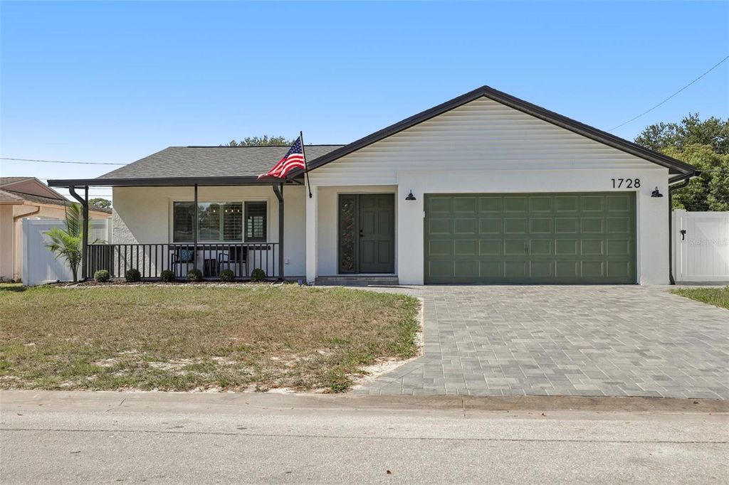 Photo of 1728 W Lagoon Circle, Clearwater, FL 33765 (MLS # TB8437953)
