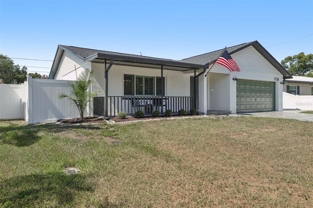 Photo of 1728 W Lagoon Circle, Clearwater, FL 33765 (MLS # TB8437953)