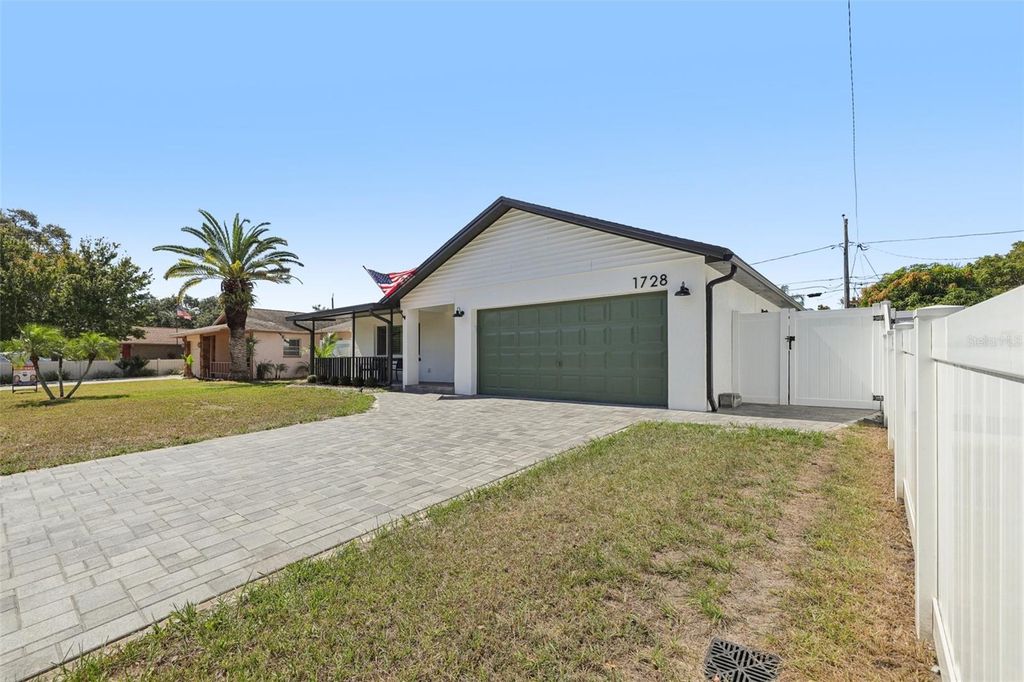 Photo of 1728 W Lagoon Circle, Clearwater, FL 33765 (MLS # TB8437953)