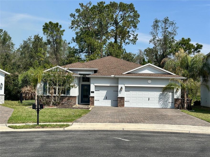 Welcome to the "EAGLE'S NEST HOME". Come live in this beautiful cul-de-sac right alongside a pair of American Eagles! A classic Floridian home featuring numerous upgrades. Carpet free, Custom woodwork throughout nearly the entire house, including a custom-designed walk-in closet and a super-spacious home office studio built into a side of the 3 car garage. Huge driveway to fit 6 cars. The property boasts a large, fully fenced lot, back to the conservation and an outdoor leisure area nestled practically within the woods, featuring an extended lanai, full of privacy. This is the "Eagle's Nest Home"!