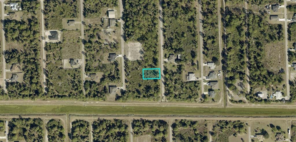 Photo of 6005 Sally Avenue N, Lehigh Acres, FL 33971 (MLS # A4700957)