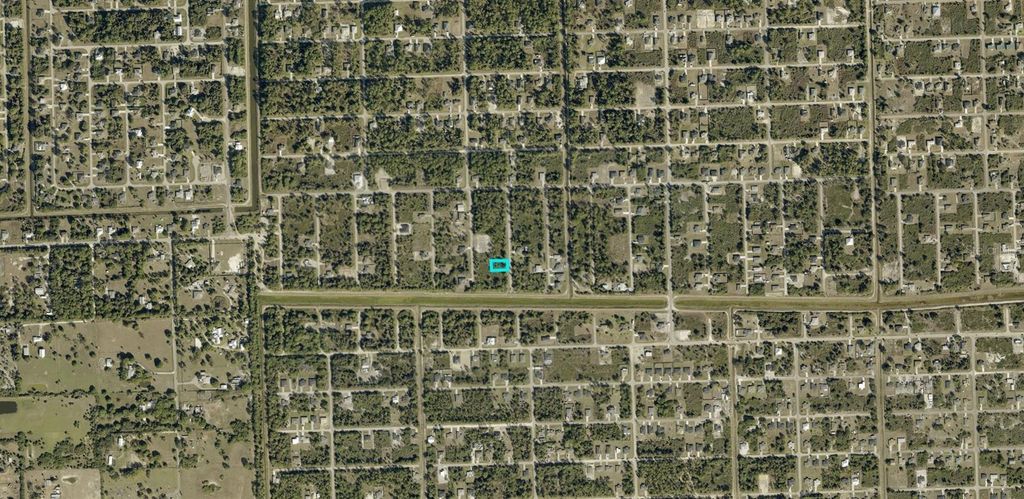 Photo of 6005 Sally Avenue N, Lehigh Acres, FL 33971 (MLS # A4700957)