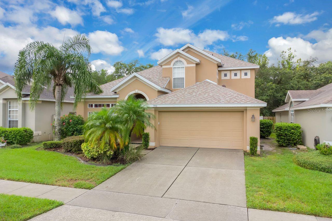 Welcome to the highly sought-after gated community of Parkstone in Winter Springs—an established resort style neighborhood known for its charm, tranquility, and top-rated A-rated schools.
Recently updated with a new roof (July 2024) and HVAC system (2020), this 2,375 sq. ft. residence offers the ideal balance of timeless elegance and everyday functionality. From the moment you step inside, you're greeted by a bright and airy open floor plan filled with natural light and soaring ceilings.
The first-floor primary suite is a true retreat, thoughtfully placed at the rear of the home for added privacy. Enhanced with crown molding, this spacious room exudes quiet sophistication and comfort. The en-suite bath is beautifully appointed with a five-piece layout including a private water closet, separate soaking tub, glass-enclosed shower, dual vanities, a dedicated makeup station, a generous walk-in closet, and a linen closet.
Upstairs, you’ll find three additional bedrooms, offering plenty of space for family, guests, or a home office. Upon entry, the formal living and dining rooms are located to the left—perfect for hosting. The dining room features an elegant tray ceiling and a statement glass chandelier that adds a refined touch.
Throughout the home, plantation shutters dress every window, allowing light to filter beautifully into each space. The kitchen, dinette, and family room enjoy vaulted ceilings, creating a spacious and welcoming environment. The kitchen offers a breakfast bar and a dinette overlooking the family room and the screened enclosure, allowing for seamless indoor-outdoor living and entertaining.
Additional highlights include a dedicated interior laundry room and a convenient guest bath on the main floor—ideal for hosting gatherings.
One of the standout features of this home is its premium location backing up to the scenic Cross Seminole Trail—a well-loved paved trail perfect for walking, jogging, and biking. Whether you’re enjoying a peaceful morning walk or an evening bike ride, this trail offers direct access to nature and recreation just steps from your backyard. A sturdy brick privacy wall separates the home from the trail, providing a peaceful buffer while still allowing you to enjoy the convenience and beauty of this amazing outdoor amenity
Living in Parkstone means enjoying maintenance-free landscaping provided by the HOA, plus a wide range of community amenities: a resort-style pool, tennis and volleyball courts, walking trails, two playgrounds, and a private dock and fishing pier. Just minutes from Central Winds Park, the new pickleball courts, dog park, shopping, dining, and entertainment, this home delivers an exceptional lifestyle in one of Winter Springs' most desirable communities.