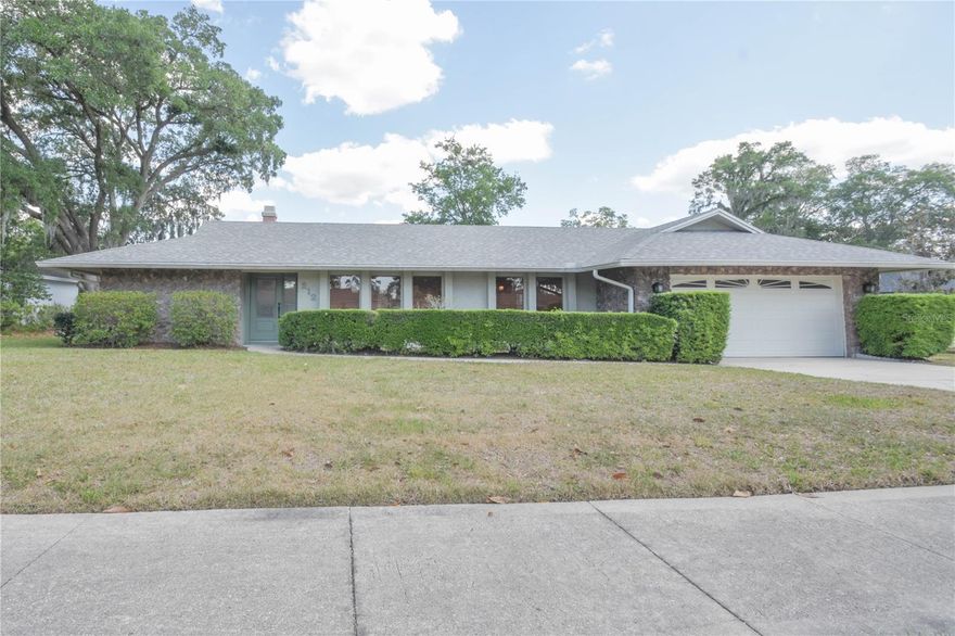 Under contract-accepting backup offers. Welcome to The Woodlands!  This beautifully maintained 4 bedroom, 2 bathroom, POOL home checks all the boxes, and is move-in ready! There's also a BRAND NEW ROOF!  The living room, dining room, family room, and primary bedroom all feature beautiful hardwood floors, and the remaining bedrooms are carpeted. All bedrooms have ceiling fans with lights, and generous closet space.  Both bathrooms are nicely updated with designer vanities and granite countertops.  The kitchen features solid wood cabinets, granite countertops, a beautifully tasteful backsplash, and updated appliances. Off the kitchen you will find the large utility room with lots of storage. Peak around the corner in the garage to find a hidden bonus/storage room with a wall-unit AC - perfect for extra storage or even a private office! Head out back to enjoy the screened-in lanai and large saltwater swimming pool. This HUGE back yard is a dream - and fully fenced!  Additional remarkable features of this property include a natural gas grill, a whole house generator on natural gas, and a natural gas tankless water heater. This home is zoned for AMAZING Seminole County Schools - Woodlands Elementary, Rock Lake Middle, and Lyman High!  Do not miss this fantastic opportunity!