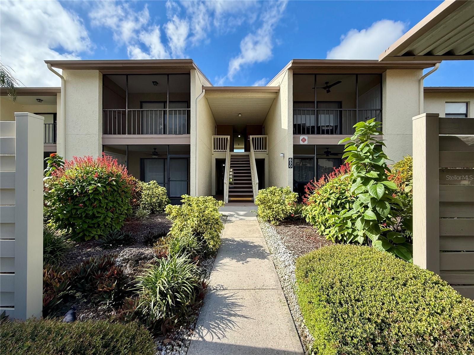 INVESTMENT ALERT! Take advantage NOW in this buyer’s market and purchase this meticulously and lovingly maintained 2 bedroom/2 bath PLUS FLEX ROOM that is priced to sell! Close on one day and lease the next day, taking advantage of seasonal leases that maximize your rental income! Enjoy 1,062 square feet of interior space, along with a 110-square-foot screened lanai offering beautiful southern views. The flex room/bonus room/bedroom enhances the unique design of this condo that can be used as a third bedroom, or the hidden partition can be left open for expanded living space. There is also a dedicated door in the flex room leading directly to the hallway across from the guest bathroom adding convenience. Laundry facilities are easily accessible behind closed doors on the screened lanai and a graceful palm tree just outside that showcases views of a SERENE POND, providing a peaceful and relaxing atmosphere. Bird Bay Village is an active community and in addition to a dedicated pool for the residents of Phase V exclusively, there are numerous other amenities, including a Junior Olympic swimming pool, fitness center, pickle-ball courts, tennis courts, and a clubhouse with a full kitchen. The location benefits residents by offering close proximity to Venice Island, which provides access to a variety of dining, shopping, arts, and beaches. Additionally, the community is connected to the Legacy Trail, a nearly 20-mile path extending from Venice to downtown Sarasota, ideal for outdoor activities like walking, biking, and exploring. This makes Bird Bay convenient for both leisure and everyday needs. This unit is ideal for seasonal retreats, income-generation, or full-time residence within the award-winning Suncoast of Sarasota County. Bright and welcoming, this turnkey-furnished condo is competitively priced and ready for its new owner. This is truly a hidden gem for anyone looking to call it home or looking for an investment so be sure to scroll through all the pictures and don't wait, schedule your private showing today! Pictures of kitchen appointments are available upon request.