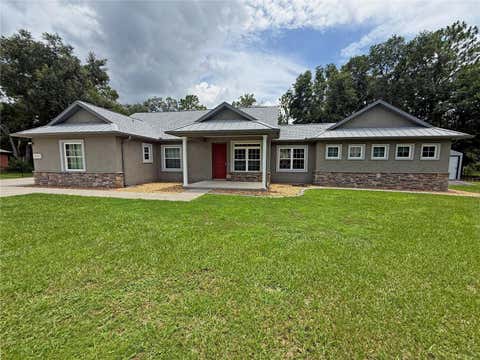 Photo of 11691 SW 52nd Avenue, Ocala, FL 34476 (MLS # OM728842)