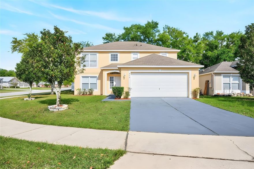 One or more photo(s) has been virtually staged. Fresh UPDATES and a FLEXIBLE LAYOUT make this 4-bedroom, 2.5-bath home in Groveland’s Lake Dot Landing community a standout opportunity with room to grow and a location central to everyday conveniences! Major updates already done for you include - a NEW A/C (2025), NEW LUXURY VINYL PLANK FLOORING (and easy care tile) throughout, FRESH INTERIOR & EXTERIOR PAINT, and a NEWER ROOF (2019), along with some updated kitchen appliances, giving the home a clean, move-in-ready feel from the moment you arrive. Positioned on a CORNER LOT, this home welcomes you with a two-story foyer that creates an open, airy first impression. The first floor offers formal living and dining spaces, ideal for entertaining or flexible use as a home office, playroom, or additional gathering area. At the heart of the home, the well-equipped kitchen delivers a prep island, ample cabinet and counter space, and abundant storage, while remaining open to a light-filled breakfast nook and the spacious family room, creating a natural flow for everyday living. A convenient half bath and laundry room completes the main level. Upstairs, all four bedrooms are thoughtfully arranged for privacy, along with a second full bath. Your PRIMARY SUITE is a comfortable retreat, featuring DUAL WALK-IN CLOSETS and a dedicated en-suite bath with a soaking tub and separate shower. Bedroom four offers added versatility – perfect as a bonus room, office, or flex space, with architectural cutouts that overlook the foyer below and add visual interest to the design. Being a resident of Lake Dot Landing means enjoying a quieter setting outside the hustle and bustle of Orlando, while still having easy access to SR 50 for commuting and travel. You are just minutes from Publix, local dining, parks, playgrounds, and nearby trails, with the beautiful Clermont Chain of Lakes close by for boating, fishing, and weekend recreation. If you have been looking for a move-in ready home with room to grow in a convenient Groveland location, this one checks all the boxes. Call today to schedule a tour!