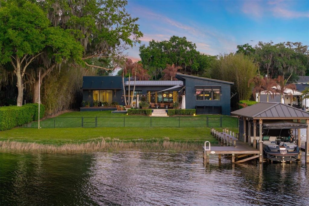 Photo of 5210 Oak Island Road, Belle Isle, FL 32809 (MLS # O6393116)