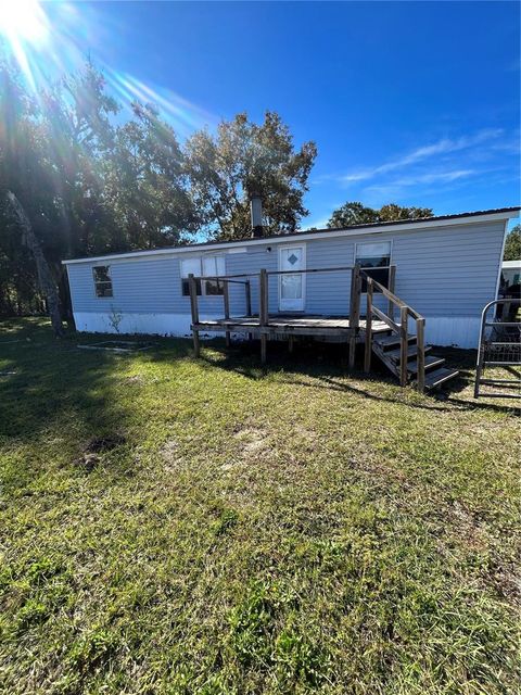 Photo of 350 Ishie Avenue, Bronson, FL 32621 (MLS # GC538104)
