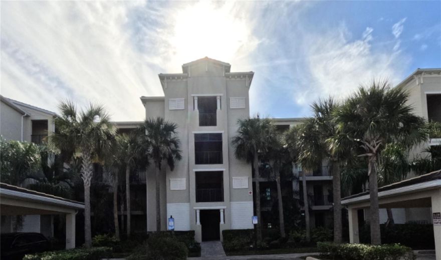 Welcome to this beautifully maintained 2nd-floor corner condominium located in the highly sought-after Lakewood National Golf Club community in Lakewood Ranch. This spacious 3-bedroom, 2-bath residence offers an open floor plan with impact windows and doors, crown molding, and upgraded finishes throughout. Enjoy expansive golf course and water views from multiple living areas, providing a bright and inviting atmosphere. The kitchen features solid surface countertops and ample cabinet space, while the primary suite includes a walk-in closet and en-suite bath. Covered carport parking and additional storage are conveniently located just outside the front door. Lakewood National offers resort-style amenities including championship golf courses, clubhouse, pools, fitness center, dining, and more. Tenant approval subject to owner and association requirements. Application and fees may apply. Schedule your private showing today.