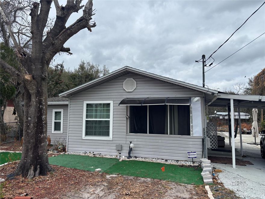 Charming 3 bedroom 1 bathroom home located just blocks from US 92 (Memorial) and Combee Road close to stores, shopping, transportation and convenient to I4 for quick commute to Orlando and Tampa. You will LOVE the big fenced in back yard endless possibilities, 1 car carport. This home has upgrade windows over two years ago. A very affordable home, central A/C system in 2021, and freshly painted. Please call today to request a private viewing before it is gone.!