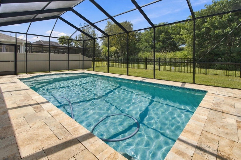 Photo of 11035 Laxer Cay Loop, San Antonio, FL 33576 (MLS # TB8552393)