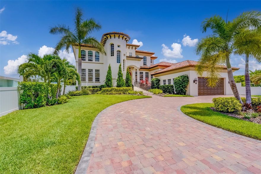 Exquisite Coastal Waterfront Luxury Home on St. Pete Beach Indulge in the epitome of refined coastal living with this spectacular waterfront 4-bedroom, 4-bathroom pool residence, located in one of the most coveted enclaves of St. Pete Beach. Offering over 4,475 square feet of unparalleled elegance, this 2007-built masterpiece has been meticulously designed to ensure comfort, security, and opulence at every turn. This property boasts a wealth of recent upgrades that enhance both functionality and luxury. Equipped with a state-of-the-art Luma View Security System, your peace of mind is always assured. The residence remains in pristine condition, having withstood both recent hurricanes without sustaining any water damage, a testament to its solid construction and thoughtful design. Upon entry, you're greeted by a stunning chef's kitchen that redefines culinary excellence. Featuring custom cabinetry, a professional-grade gas range, a sprawling walk-in pantry, and quartz countertops, it?s a space meant for creating unforgettable meals. A spacious island serves as the heart of the kitchen, perfect for gatherings and casual dining. For those who enjoy entertaining, the adjacent wet bar, complete with a wine fridge, is ideal for hosting guests in style. The home's expansive layout is bathed in natural light, thanks to the large hurricane impact windows throughout, providing both safety and beauty. A sweeping staircase leads you to the second floor, where newly installed hardwood floors add an element of warmth and sophistication. Custom drapery and window treatments complement the space, further elevating the home's luxurious feel. The newly remodeled media room is an entertainer's dream, featuring a built-in bar and ample space for watching movies or relaxing with friends. Whether it's a cozy movie night or an elegant cocktail party, this room effortlessly sets the tone for any occasion. Step outside into your own private paradise. The backyard is a tropical oasis designed for ultimate relaxation and enjoyment. Take a refreshing dip in the saltwater pool, surrounded by lush, newly landscaped gardens. A new pool pump installed in February, ensures that every element of this home is in impeccable condition. For boating enthusiasts, the 63 feet of pristine waterfrontage is complemented by a new sea wall, a 2021 Trex dock, and a 30,000lb boat lift (installed in 2022), offering easy access to the open water. Whether you're an avid boater or simply love watching the marine life play from your dock, this residence is the perfect place to do both. This coastal gem also features a water treatment system that softens and filters the water throughout the entire home, ensuring every drop is pure and perfect. With a 2-car garage and an array of high-end amenities, including a top-of-the-line washer and dryer, Control 4 Audio-Visual System, and all TVs, no detail has been overlooked. Located just minutes from the pristine sands of St. Pete Beach, this property offers the ideal blend of luxury, privacy, and coastal charm. A true sanctuary, this home is waiting to become your own personal retreat.