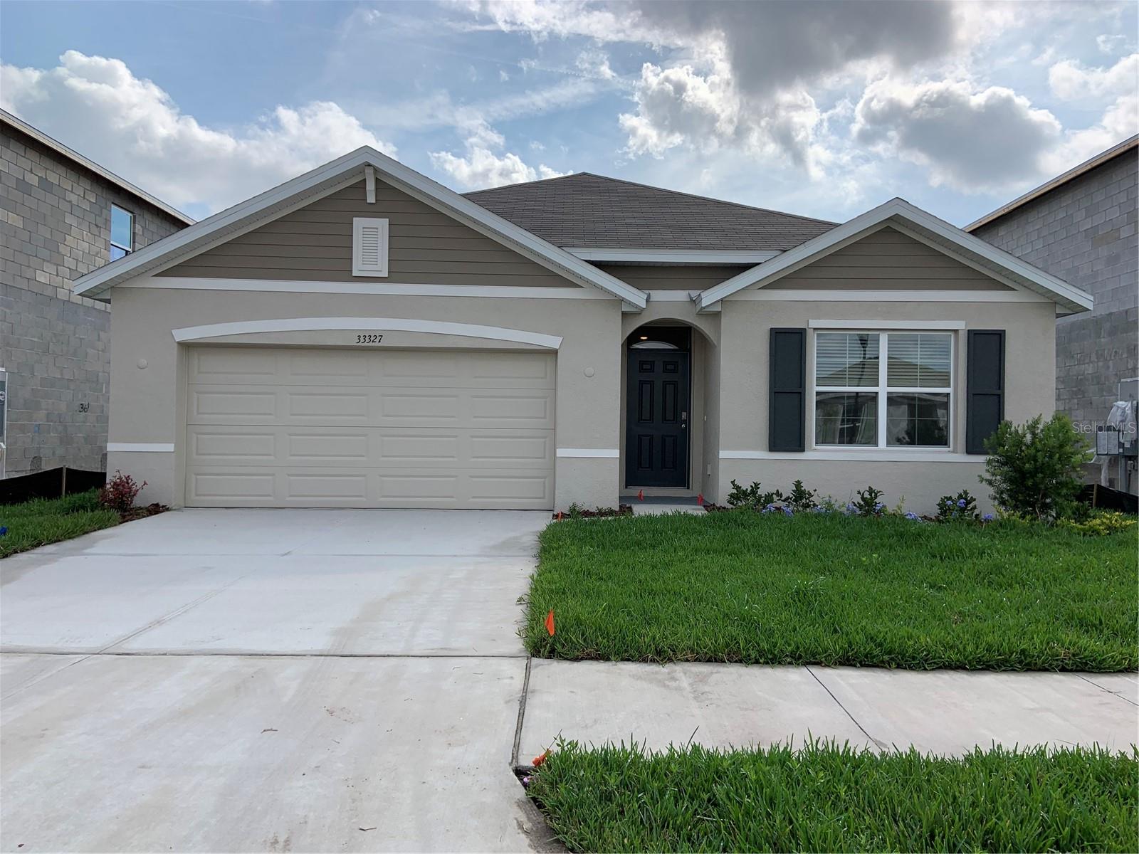 Like New home in Wesley Chapel, 4 bedrooms 2 baths 2-car garage, one story, perfect for any family. Nice WATER VIEW in the backyard can be viewed from family, dining room and master bedroom. Open floor plan, modern kitchen with light color cabinets, granite counter and SS appliances. Separate dining and living/family space. Walk in closet, laundry room, washer/dryer. Close to school, shopping and major roads. Community has pool, walking trails, playground etc.
