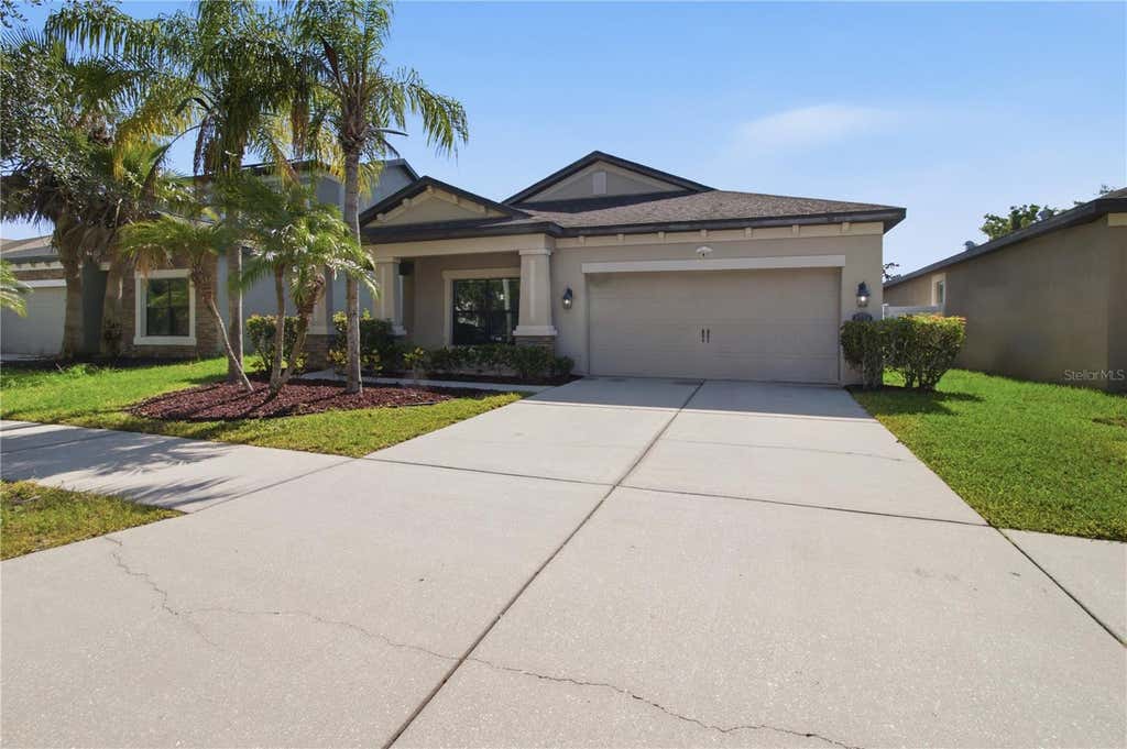 Photo of 4738 Woods Landing Lane, Tampa, FL 33619 (MLS # A4701127)