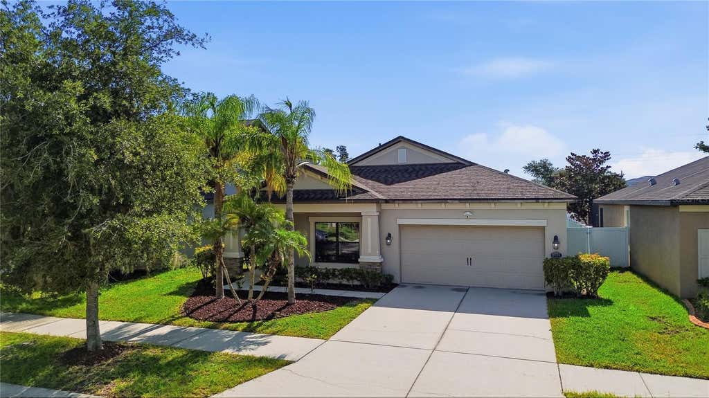 Photo of 4738 Woods Landing Lane, Tampa, FL 33619 (MLS # A4701127)