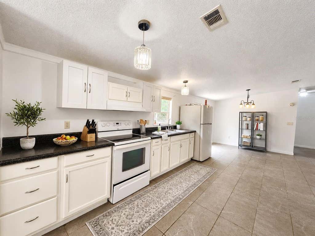 Photo of 14210 NE 50th Place, Williston, FL 32696 (MLS # OM726423)