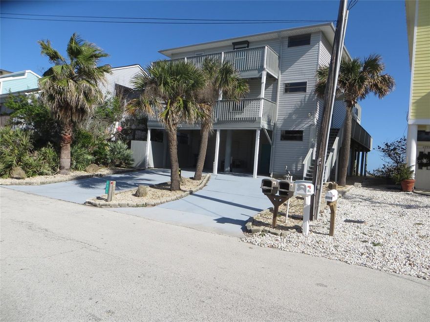 Spacious balconies on this oceanfront home. Six bedrooms/Four Baths, second and third floor have laundry area, spacious oversized garage with workshop area. Electric stair lift to each floor. Two living areas one on second floor and the other on the third floor. No driving on the beach area. Within walking distance to Canaveral National Seashore. Sit on the deck and enjoy watching the space launches! Walk to JB's for lunch or dinner. Quiet end of the beach. ;Water: City