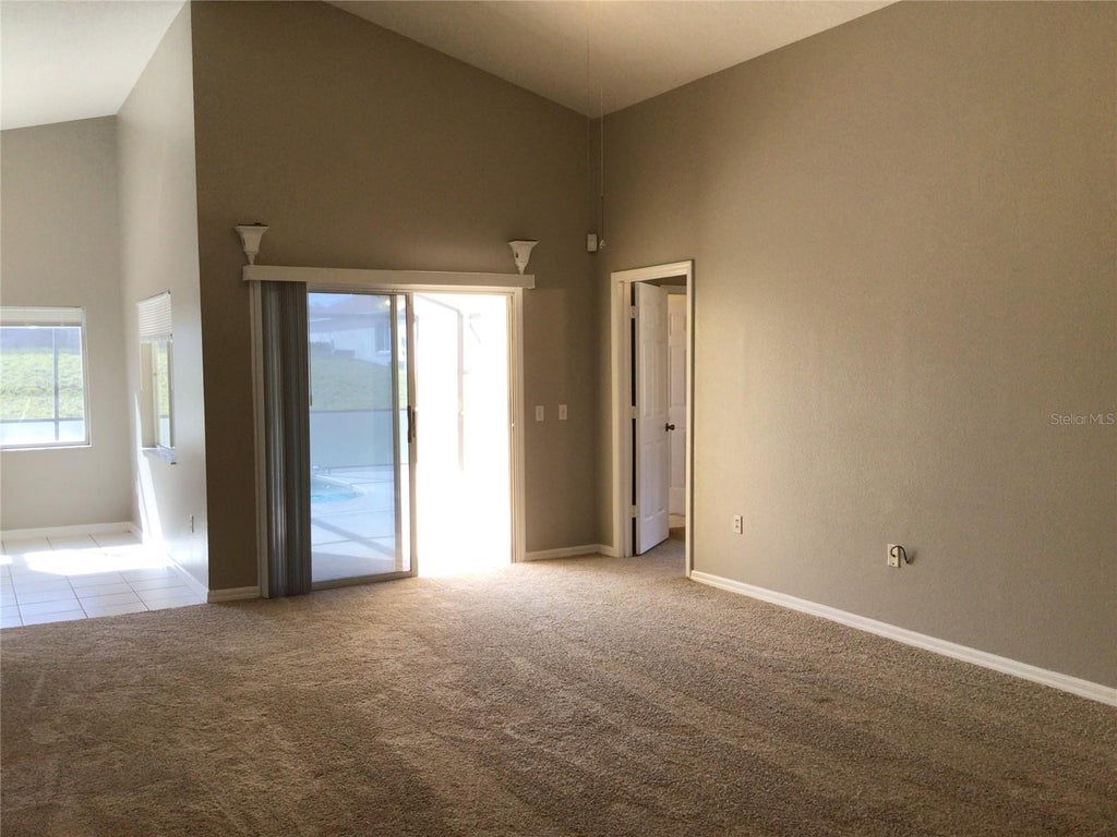 Photo of 509 Hillcrest Drive, Davenport, FL 33897 (MLS # O6432427)