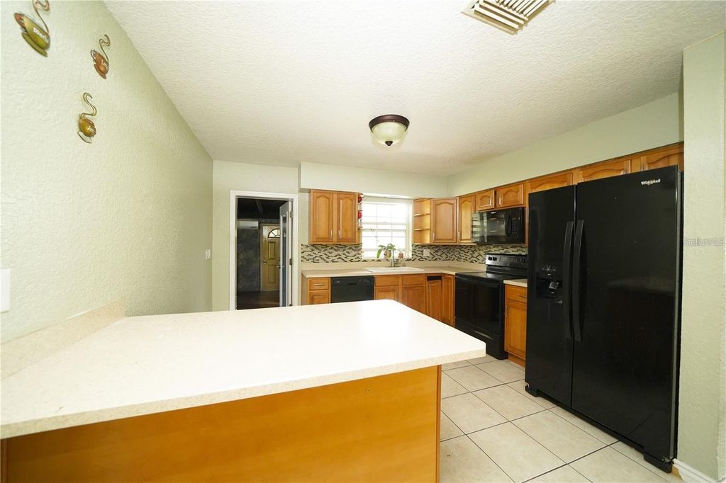 Photo of 113 Citrus Drive, Winter Haven, FL 33884 (MLS # O6382305)