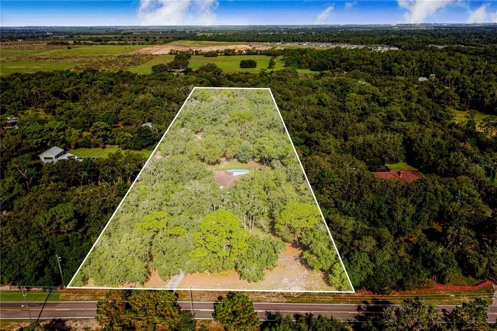 Photo of 10740 Jim Edwards Road, Haines City, FL 33844 (MLS # P4939291)