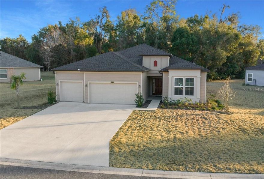 This thoughtfully designed single-story new construction home—completed over a year ago and never occupied—features an open-concept layout where the Great Room, kitchen, and café flow seamlessly together, creating an inviting space for both everyday living and entertaining. A formal dining room and covered lanai provide additional areas ideal for hosting gatherings.

A versatile study/den offers flexible use as a home office, media room, or playroom. With the inclusion of a closet, this space may also function as a fourth bedroom, depending on buyer preference.

The kitchen is designed with a center island, abundant cabinetry, quartz countertops, and a pantry, providing both style and functionality. The owner’s suite includes a spacious walk-in closet and direct access to the covered lanai. The en-suite bathroom features dual sinks, a tiled shower, and a separate water closet.

A three-car garage completes this well-planned home. The property is located in a master-planned community with low HOA fees and offers access to Rainbow Springs, all within a growing and desirable area convenient to medical facilities, shopping, dining, and everyday necessities. An excellent opportunity to own a never-lived-in home—seller circumstances create a unique advantage for the next owner.
