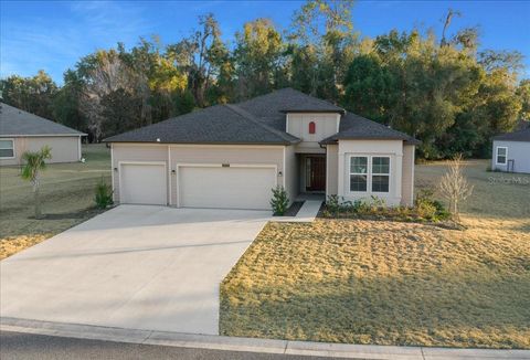 Photo of 19735 SW 77th Loop, Dunnellon, FL 34432 (MLS # OM717245)