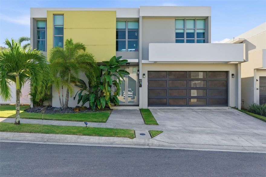 Located in the highly sought-after Montecielo community in Guaynabo, this exceptional Montesol model—the largest floor plan in the neighborhood—offers an outstanding combination of space, privacy, and lifestyle. Situated on a corner lot of approximately 675 square meters, the property is strategically positioned within the community and designed for comfortable family living.

The residence features 4 bedrooms, 3.5 bathrooms, and approximately 2,980 square feet of Gross Living Area (GLA). The layout includes an expansive primary bedroom, a dedicated laundry room conveniently located at the bedroom level, and well-distributed living spaces ideal for both everyday living and entertaining.

Outdoor areas are highlighted by a custom pool and covered terrace, complemented by a spacious backyard with excellent privacy. Additional features include a full power generator and water cistern, ensuring comfort and reliability year-round.

Montecielo is known for its family-oriented environment, strong sense of community, and quality of life, where residents enjoy well-maintained common areas, and a secure, organized neighborhood setting.