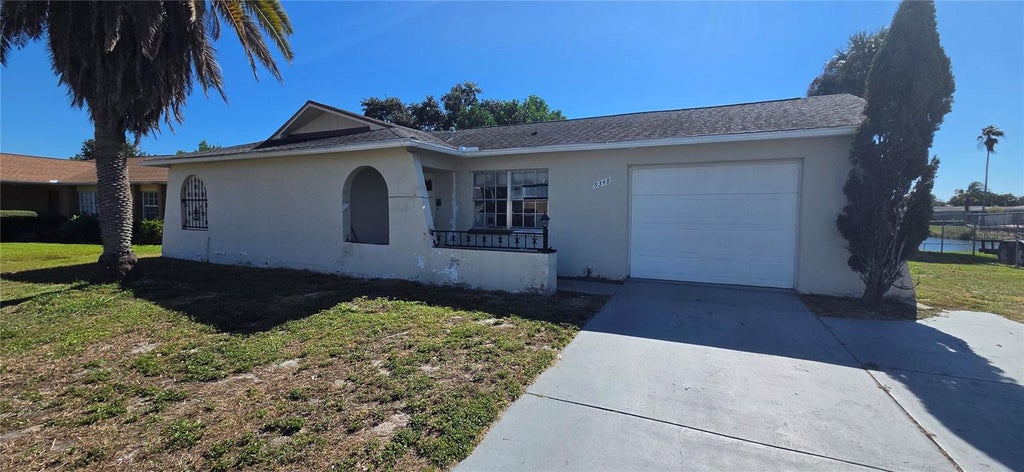 Photo of 9348 Lake Christina Lane, Port Richey, FL 34668 (MLS # W7890583)