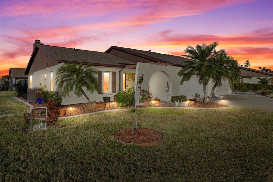 2023 NEW ROOF. HURRICANE IMPACT WINDOWS. 2020 HVAC. 2014 GARAGE DOOR. NO CARPET. 2-BEDROOM. 2-BATHROOM. 2-CAR GARAGE. FRESHLY PAINTED MAIN LIVING AREAS. Welcome to this beautifully updated and meticulously maintained villa in the vibrant 55+ community of Foxwood! This 2-bedroom, 2-bathroom home offers peace of mind and modern comfort with a NEW ROOF (2023), hurricane impact windows, a 2020 HVAC system, and a 2014 garage door replacement. As you approach the home, a charming front entrance adorned with colorful flowers sets the tone. Step inside to discover a bright and inviting split floor plan designed to provide privacy and comfort for both the primary and guest suites. The living room welcomes you with a cozy fireplace and brand-new vinyl plank flooring, while the adjoining dining area features large windows that flood the space with natural light—perfect for entertaining or everyday meals. The kitchen stands out with its high ceilings, elegant wood cabinetry, and coordinating tile backsplash, offering both functionality and style. A convenient indoor laundry room adds to the home’s practicality. The primary suite includes two closets for ample storage, a large window for natural light, and an ensuite bathroom with a walk-in shower. The guest suite, located near the foyer, features its own full bath with a tub/shower combination and a generous vanity. Outside, a private patio provides the perfect spot to relax and enjoy Southwest Florida’s beautiful weather, whether dining al fresco or simply unwinding in the shade. Foxwood offers resort-style amenities, including a large pool, clubhouse, tennis courts, and shuffleboard. Ideally located just one mile from historic Dearborn Street’s charming shops and restaurants and only a short drive to Englewood Beach (4 miles) and Manasota Key Beach (6 miles), this villa perfectly blends comfort, convenience, and coastal living. Copy and paste this link for a luxury video tour, https://iframe.videodelivery.net/93634a8eec342a1ce761daca3ad34f96