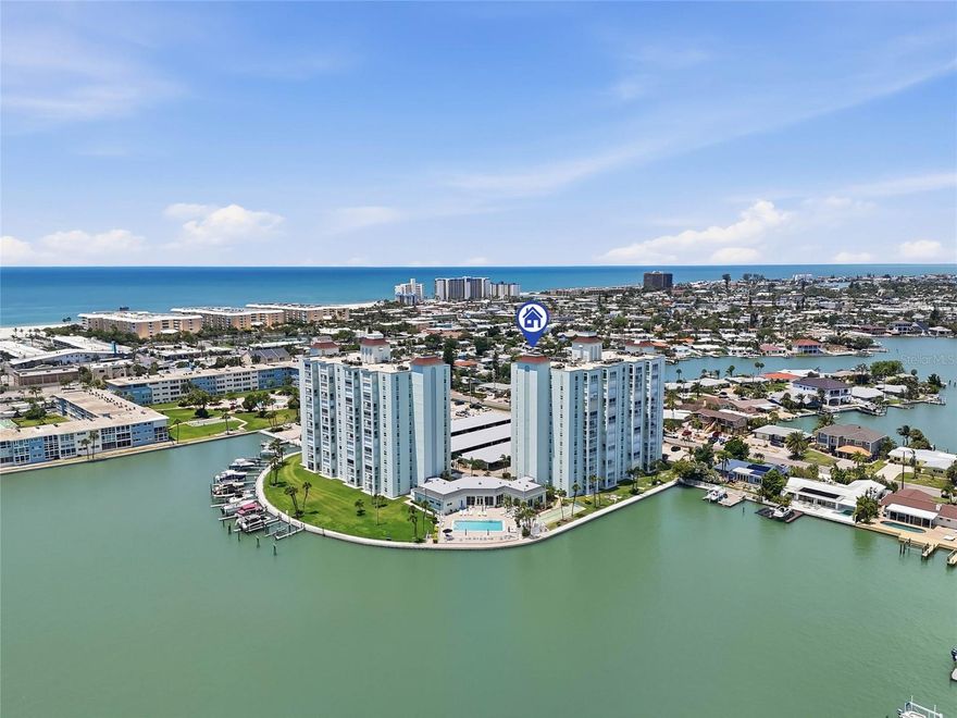 Welcome to Three Palms Pointe—your slice of coastal paradise! Perfectly located just moments from the beach, this light filled 2-bedroom, 2 full sized bathroom residence offers 1,131 square feet of relaxed, breezy living with a desirable split floor plan for added privacy. Step inside and feel the sunshine pour in—this west-facing unit is bright, airy, and designed to capture those stunning WATER VIEWS. The updated kitchen features granite countertops and custom cabinetry, perfect for easy entertaining after a day in the sand. Both bedrooms are generously sized and provide water views! If you are looking for convenience the home can come FULLY FURNISHED—just bring your flip flops and settle right in. Unwind each evening on your private covered balcony, where you can soak in breathtaking sunsets and coastal breezes. Additional highlights include manual hurricane shutters for peace of mind, an assigned parking space, and a storage unit to pack away your beach wagon and chairs! Three Palms Pointe delivers resort-style living, featuring a guard-gated entrance, complimentary laundry located on each floor, heated pool, club house with amazing waterfront views, billiards, fitness center, shuffleboard, a fishing pier, and boat slips available by reservation and onsite property management. Beachy, and effortlessly convenient—Whether you're looking for a full-time residence, beachside getaway, or an investment opportunity (minimum 3 month rental, twice a year) this is Florida living at its best—sun, sand, and sunsets await! Schedule your private showing today.