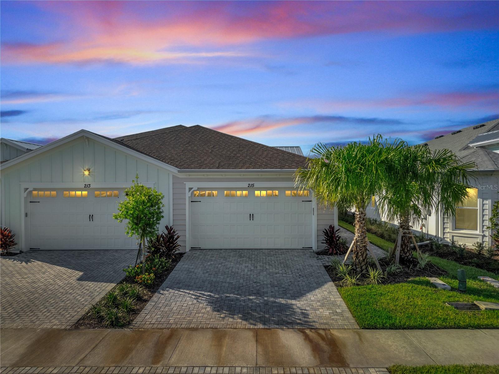 LOCATION!LOCATION!LOCATION!!LAKE VIEW NEW 2025 ANTIGUA VILLA, Margaritaville Latitude, short walk to amenities,55 plus community, Active lifestyle: Amenities include a large outdoor pool, indoor pool with steam room, spa, shower, and locker room; restaurant, gym, pickleball, bocce ball, tennis courts, walking trails, private beach club(Ormond Beach) with pool and entrance to ocean where chairs and umbrellas will be provided, as well as shuttle service. Other amenities include a business center, woodworking shop, pottery room, game room, wine tasting room, and theater, all included for your enjoyment. This wonderful lifestyle open floor plan is an amazing NEW ANTIGUA MODEL VILLA 2025 one of the biggest villa plans. It has 2 bedrooms, 2 full Baths, 2-car garages, Large porch creating two entrances. The Living room and Dining room have high ceilings giving this home a spacious open feel with a beautiful view. The Kitchen has cabinetry, granite, countertops and a complete set of appliances.