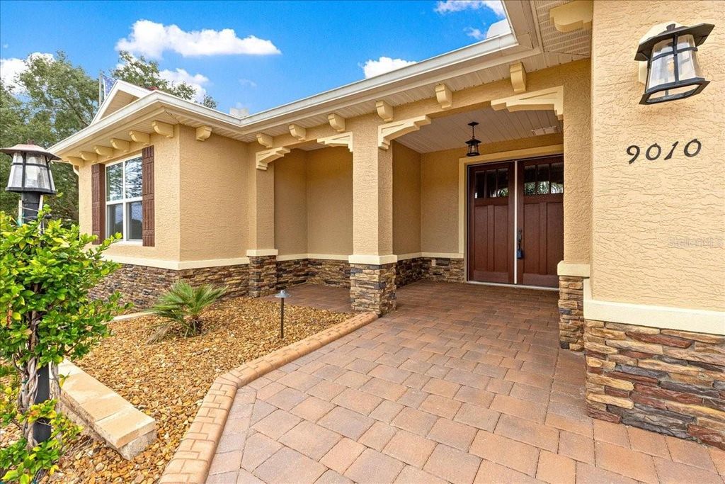 Photo of 9010 SW 89th Loop, Ocala, FL 34481 (MLS # OM710835)