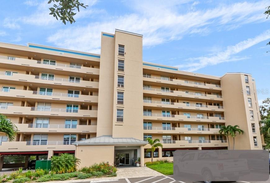 NEW LISTING!! Gorgeously updated 1 Bed 2 Full Bath TOP FLOOR condo located in Bradenton's quiet Fairways cul-de-sac. The spacious LANAI offers stunning 6th-floor VIEWS of beautiful mature landscaping, palm trees, water and wildlife over the Pinebrook Ironwood Golf Course. A light-filled eat-in kitchen boasts SS appliances, GRANITE countertops, and new light fixtures (see attached for all upgrades). With newer flooring throughout, there’s plenty of extra space, including a massive main bedroom WALK-IN CLOSET, large in-unit LAUNDRY ROOM, and assigned on-floor storage unit. Vacant & unfurnished- come see it today!!
Fairways Bldg 11 has a 2024 ROOF, and has finished both the Milestone & SIRS inspections. All ages are welcome, pets allowed (see Rules & Regs attached), and an assigned under-building GARAGE PARKING space is included. The Fairways also has 2 COMMUNITY POOLS, 1 Spa, 2 Outdoor showers, a Clubhouse with Fitness Center, Grill area, library, tennis/pickle ball courts, and GOLF (no membership req’d). Centrally located in Bradenton, Fairways is only minutes away from shopping, restaurants, gyms, IMG Academy, and GT Bray Park. Just 7 miles from Anna Maria Island beaches, 5 miles to downtown Bradenton, and 12 miles to Downtown Sarasota.