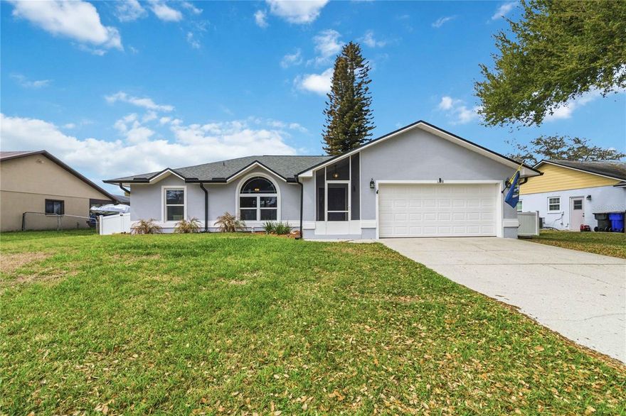 Welcome, this renovated great Decor' 3-bedroom, 2-bathroom home located in the highly desirable Canoe Creek Woods community. New roof 2024. New Generic generator. New double pane windows Feb. 2026.Front porch screened in for added shade. Step inside through the custom glass front door greeted by soaring cathedral ceilings and an open-concept family room with natural light from the Palladian window. Laminate with a natural hardwood look. Custom paint throughout. Sliding glass doors lead you to a serene, covered lanai overlooking the private, perfect for entertaining or unwinding in your own backyard oasis. The fully fenced backyard features landscaping for added privacy with lights and a Patio deck. Kitchen features all new stainless-steel appliances with a convection oven, Granite countertops, under counter lighting and extra cam lights. Large pantry with custom shelving. The expansive master suite offers direct access to the lanai from the sliding glass door and boasts two oversized walk-in closets with custom closet shelving and a spacious en-suite bath complete with a garden tub, 2 separate vanities with quartz countertops and separate shower. Ceiling fans with lights in all the rooms, even the primary bathroom. 2nd Bedroom features a chair rail, nice custom closet and shelving. Inside laundry room features a new washer and dryer, Cabinets for great storage and a new Electric tankless hot water heater. Garage features a painted floor, Pull down attic access with light in the attic and remote pully storage shelves for all your season items. Carbon dioxide detectors installed when the new generic generator was installed. Canoe Creek Woods offers a peaceful neighborhood setting with unbeatable convenience—just minutes from Florida’s Turnpike, Royal Saint Cloud Golf Course, public transportation, Central Florida attractions, and even the beaches of Brevard County. Don’t miss the opportunity to make this inviting home your own!