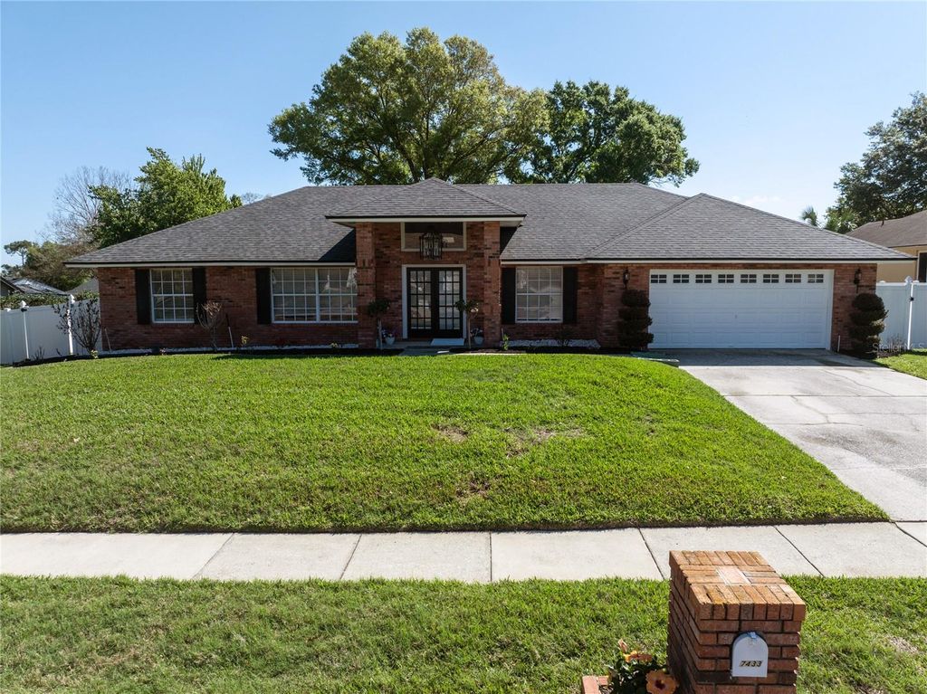 Photo of 7433 Megan Elissa Lane, Orlando, FL 32819 (MLS # O6390663)