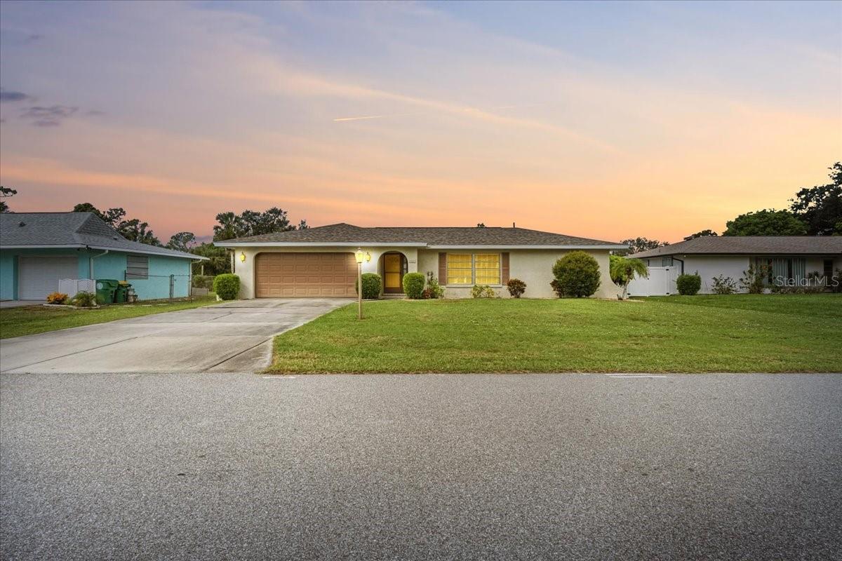 FLORIDA COMFORT MEETS COASTAL CONVENIENCE IN THIS UPDATED PORT CHARLOTTE GEM. Welcome home to this meticulously maintained and generously sized 2-BEDROOM, 2-BATH RESIDENCE, complete with a 2-CAR GARAGE and SEPARATE STORAGE SHED—offering the perfect balance of style, function, and Florida ease. Step inside through the PRIVATE FOYER and discover an inviting EAT-IN KITCHEN at the heart of the home. The front LIVING ROOM flows into a formal DINING AREA, creating a thoughtful separation from the SPACIOUS PRIMARY SUITE, ideal for privacy. With a SPLIT FLOORPLAN, the guest quarters are thoughtfully tucked away beyond the REAR LANAI and cozy FAMILY ROOM, offering flexible space for entertaining or quiet relaxation. Recent updates showcase the home’s modern charm, including WOOD-LOOK PLANK LAMINATE FLOORING, CROWN MOLDING ACCENTS, and REFRESHED BATHROOMS featuring UPGRADED VANITIES. The expansive SCREENED LANAI features TILED FLOORING and SLIDING VINYL WINDOWS, inviting year-round enjoyment protected from the elements. Outside, the OVERSIZED CONCRETE PATIO and lush backyard offer the perfect setting for morning coffee or evening cocktails. Enjoy peace of mind with a NEWER ROOF (2021) and the option to purchase the home FULLY FURNISHED, making your move-in effortless. Ideally located just blocks from US-41 and mere minutes to:
- FAWCETT MEMORIAL HOSPITAL (5 MINS)
- PORT CHARLOTTE TOWN CENTER & REGAL CINEMAS (UNDER 10 MINS)
- PUNTA GORDA AIRPORT (UNDER 20 MINS)
Whether you're looking for a SERENE RETIREMENT RETREAT, a SEASONAL ESCAPE, or your VERY FIRST FLORIDA HOME, this residence offers it all—with COMFORT, CONVENIENCE, and COASTAL CHARM.