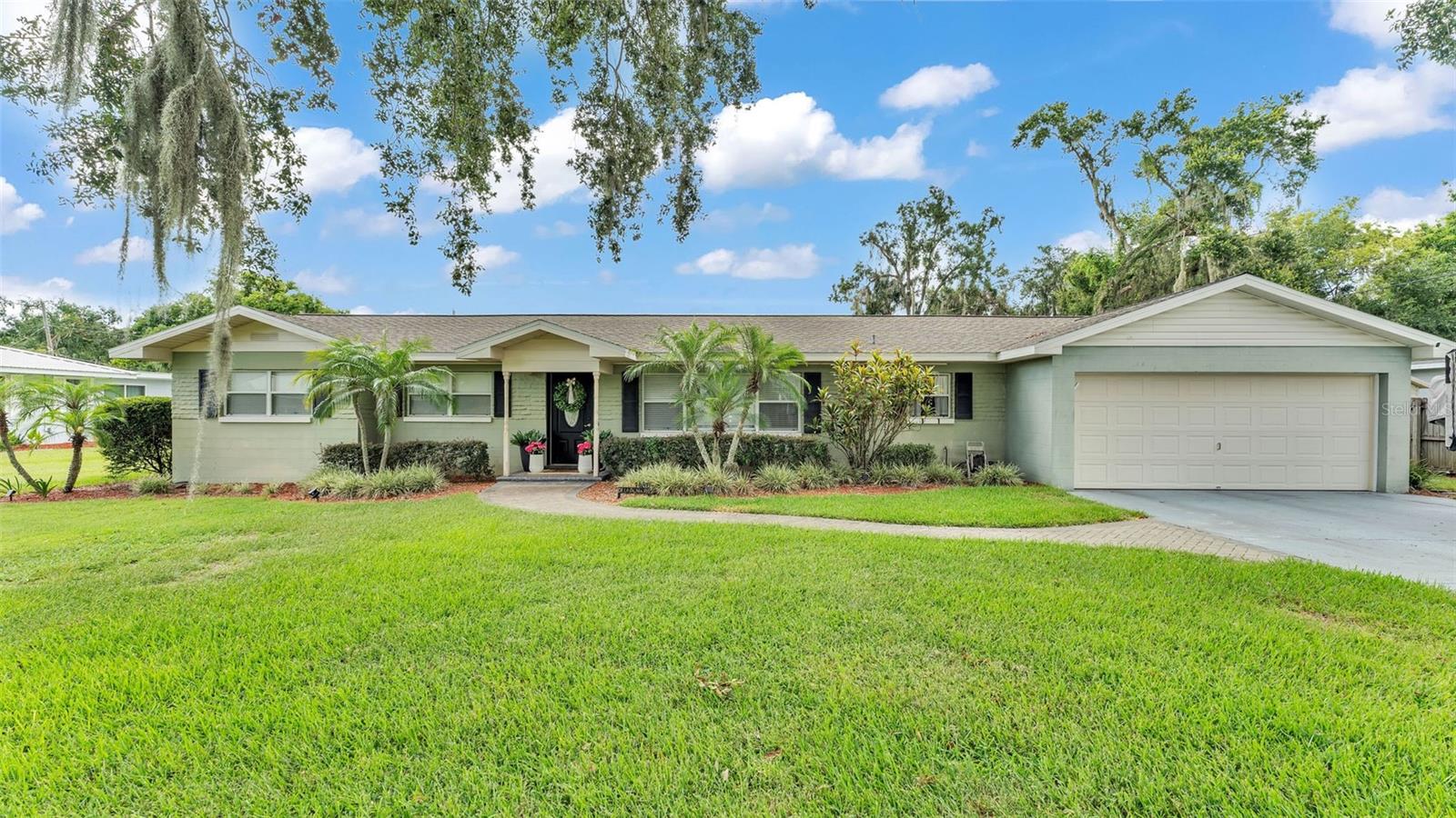 Nestled on a spacious quarter-acre lot with a fenced rear yard and no HOA, 1188 De La Palma in Bartow, FL 33830 is a tastefully updated home that perfectly blends modern comfort with timeless charm. The interior boasts a generous open great room and dining area, ideal for entertaining, while the kitchen offers ample storage to meet all your culinary needs. Multiple French doors lead to a bright Florida room, creating a seamless connection to the backyard oasis. Located near the enchanting Christmas Tree Lane, residents enjoy seasonal magic right in their neighborhood. Just minutes away, historic downtown Bartow offers a variety of charming boutique shops and dining experiences, set against a backdrop of preserved architecture and rich local history, making this home a true gem in a vibrant and storied community.
