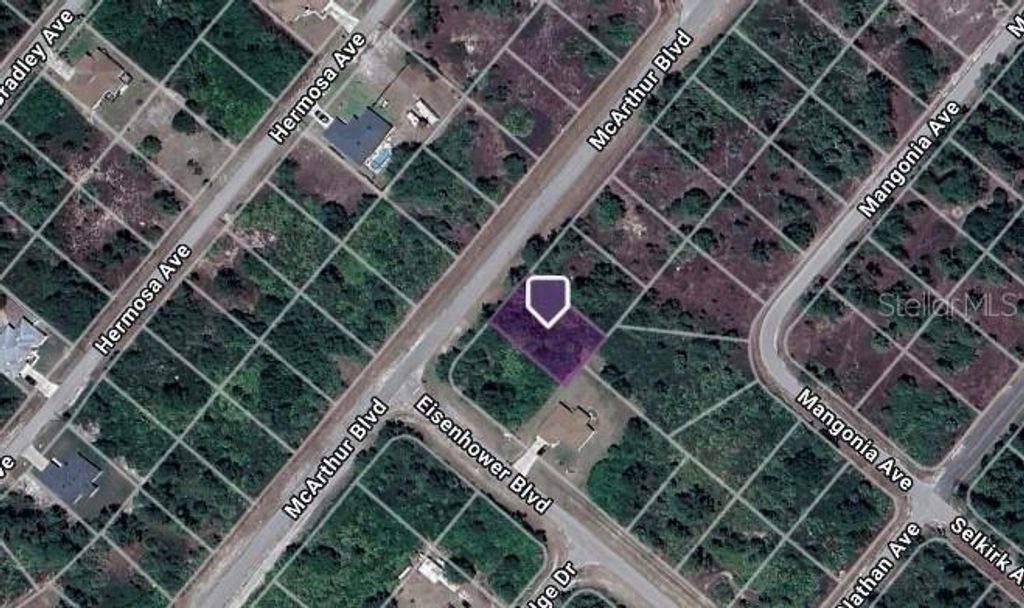 Photo of 351 Mcarthur Boulevard, Lehigh Acres, FL 33974 (MLS # C7506293)