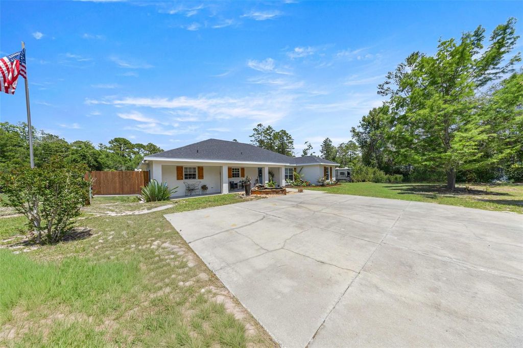 Photo of 495 Fisher Road, Ocklawaha, FL 32179 (MLS # OM725193)