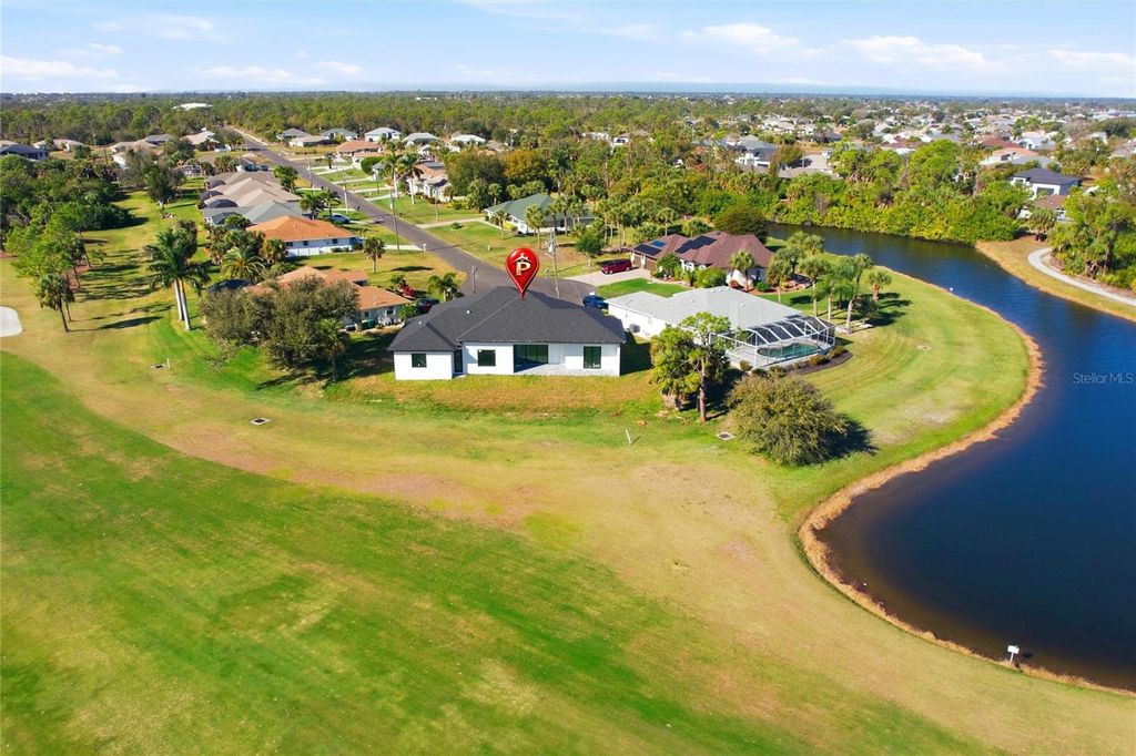 Photo of 17 Long Meadow Road, Rotonda West, FL 33947 (MLS # TB8471878)