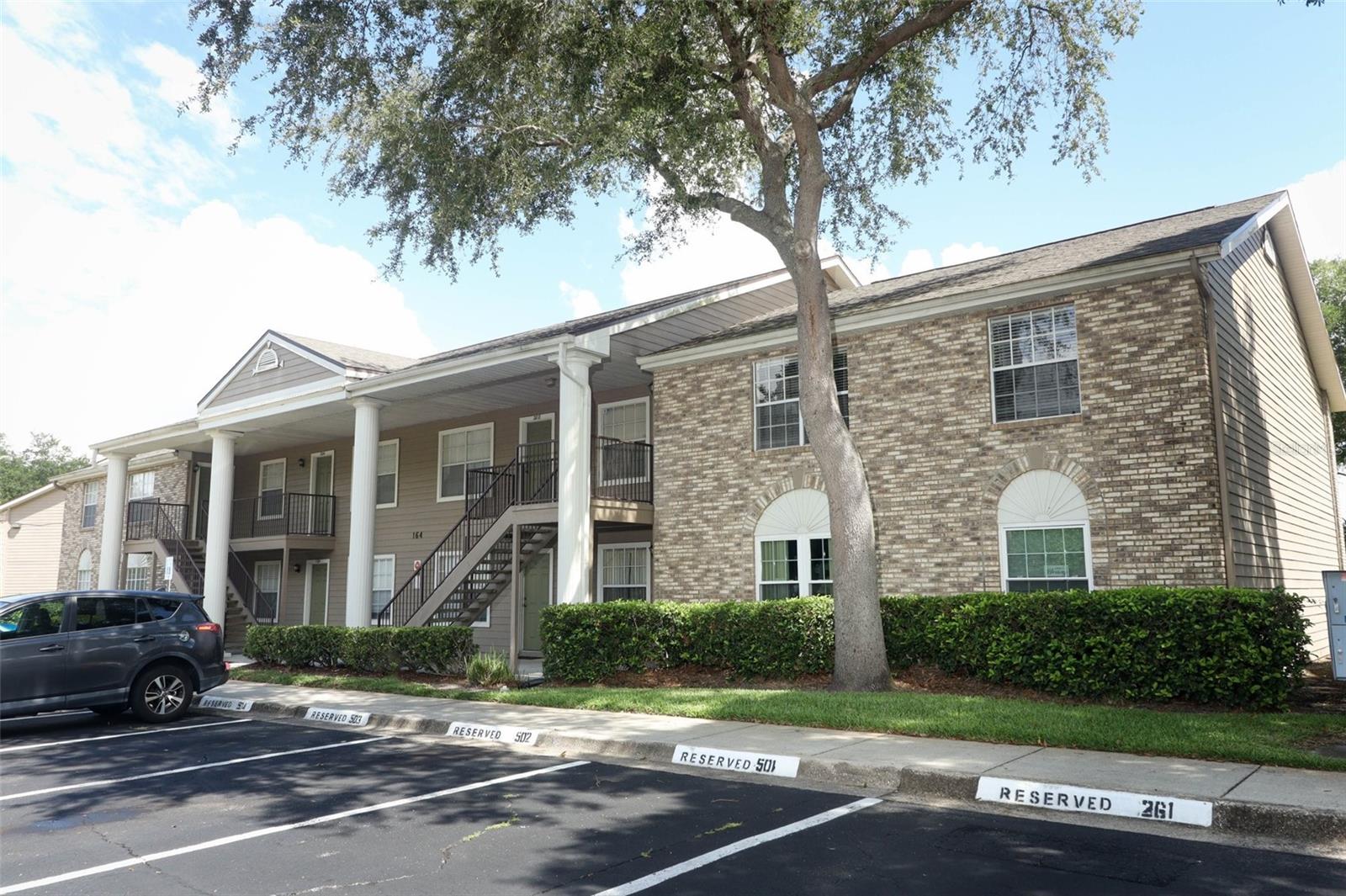 Stylish & Updated 2-Bed, 2-Bath Condo – Prime Location & Resort-Style Amenities! Step into modern comfort with this beautifully updated 2-bedroom, 2-bathroom condo, offering a perfect blend of style, convenience, and community amenities. A completely remodeled kitchen with BRAND NEW KITCHEN CABINETS (2025) provides ample storage and a fresh, modern aesthetic. The secondary bathroom also features a brand-new vanity (2025), adding to the home’s updated charm. The primary suite boasts a newer vanity (2023), while both bathrooms shine with updated light fixtures (2023). Freshly painted in 2023, this home features luxury vinyl flooring in both bedrooms for a sleek, contemporary feel. Enjoy the convenience of a stacked washer and dryer (2020) and dishwasher (2020), while the newer A/C (2018) ensures year-round comfort. Plus, the unit offers one assigned parking spot and has EXCELLENT OPEN PARKING, making daily life even easier. Located in a vibrant community with resort-style amenities, residents have access to a large swimming pool, exercise room, tennis courts, and a basketball court. The unbeatable location is just minutes from UCF and across the street from grocery stores and restaurants, making this the perfect home for UCF, professionals, or anyone looking for a well-connected lifestyle. Don’t miss out—schedule a showing today!