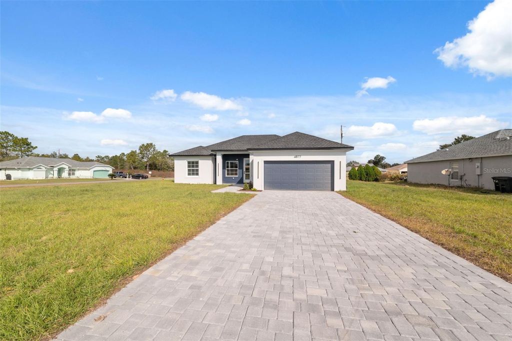Photo of 4877 SW 145th Place Road, Ocala, FL 34473 (MLS # O6358961)