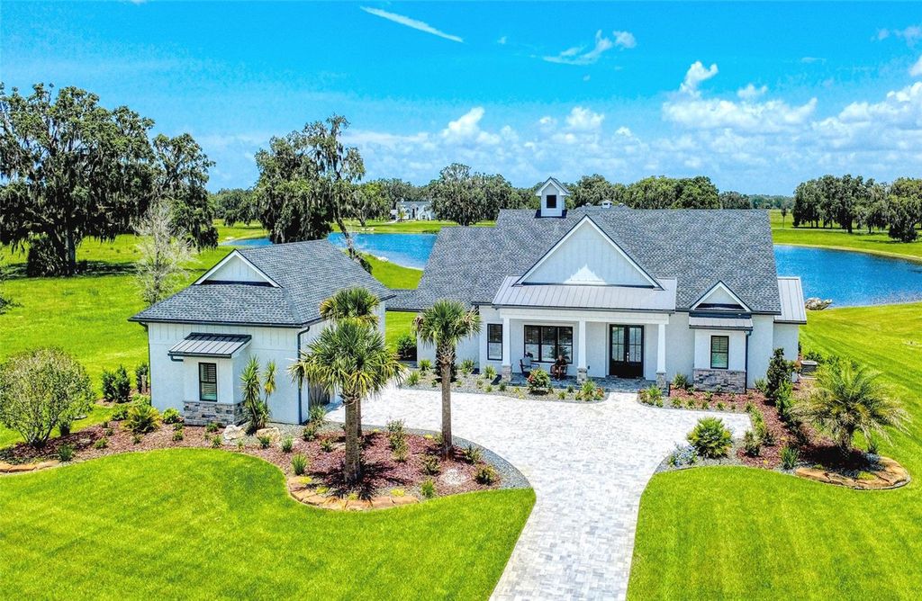 Photo of 12902 SW 138th Loop, Dunnellon, FL 34432 (MLS # TB8396502)