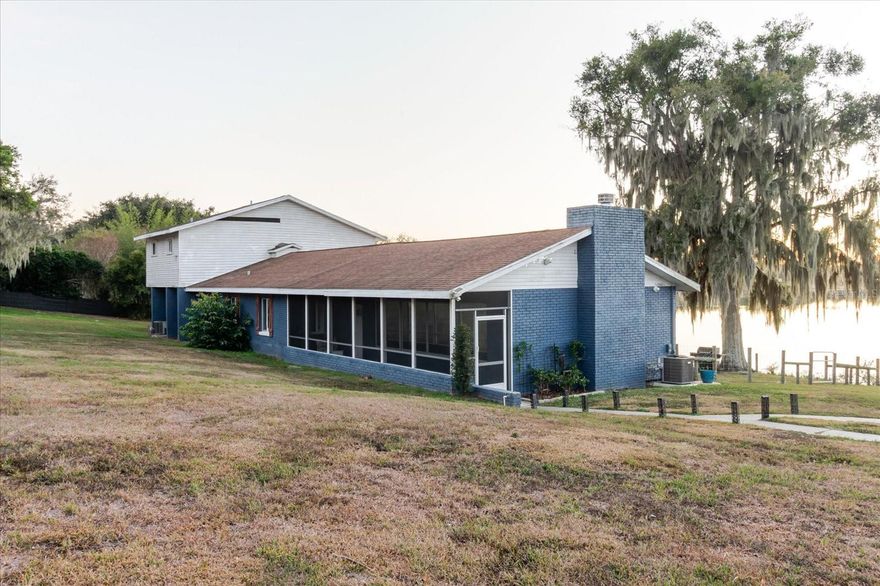 Welcome to 2120 Hurley Dr! This beautifully maintained home offers comfort, space, and privacy on over 1 acre of waterfront land. Enjoy a bright, open living space with great natural light, a practical layout, and well-sized rooms throughout. Upon entry, you’ll love the reflective window tint all throughout the front walkway leading into the living room, offering added privacy while improving energy efficiency and helping keep the heat out. The living room features a functioning fireplace, creating the perfect cozy gathering space. The primary bedroom provides a relaxing retreat, featuring new flooring on the steps leading up to the primary bedroom, adding a fresh, updated touch. Step outside to your own oasis with a private enclosed pool, perfect for entertaining, relaxing, or enjoying Florida living year-round—while taking in the beautiful sunsets you’ll enjoy from your own property. Home also includes a full LTS home security system with easy transfer to the new owner. The system is self-operated, hardwired, and can connect to a computer or TV screen, with access available both in-home and through a mobile device for added convenience and peace of mind. This home is Conveniently located near shopping, dining, schools, and major roadways. Don’t miss this rare opportunity—schedule your private showing today!